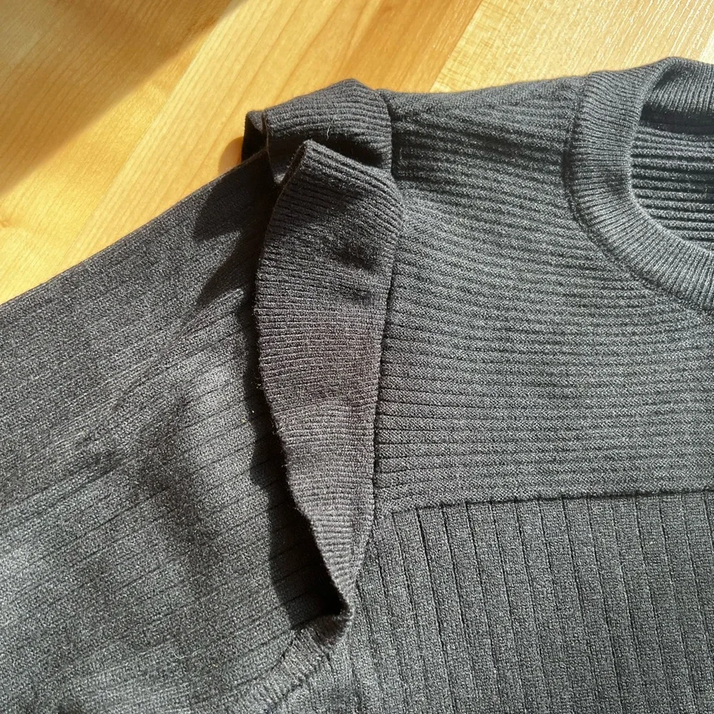 Black Ribbed Sweater with Ruffle Details - Picture 2 of 4